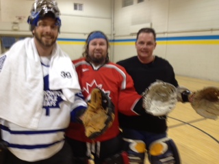 Notice anything???  All three net minders are wearing baseball gloves!