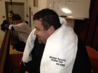 Bearcat looks on at the action ...when asked about last weeks goalie photo he said " I use to have a baseball glove when I was a little boy, but now I have a mans hand" 