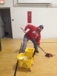 Hollywood mopping up Kapusta Kow Floor ...." The floors have not been cleaned since the Bishop was here in 1988 ", Hollywood indicated.