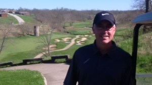 Cribzie stands at the tee box of the signature hole Of a course called 'Old Silo'......get your eyes off the handsome and dreamy Cribzie and check out the Silo !