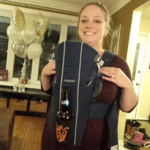  "Lady Katie models the new Tomcat Baby Carrier".